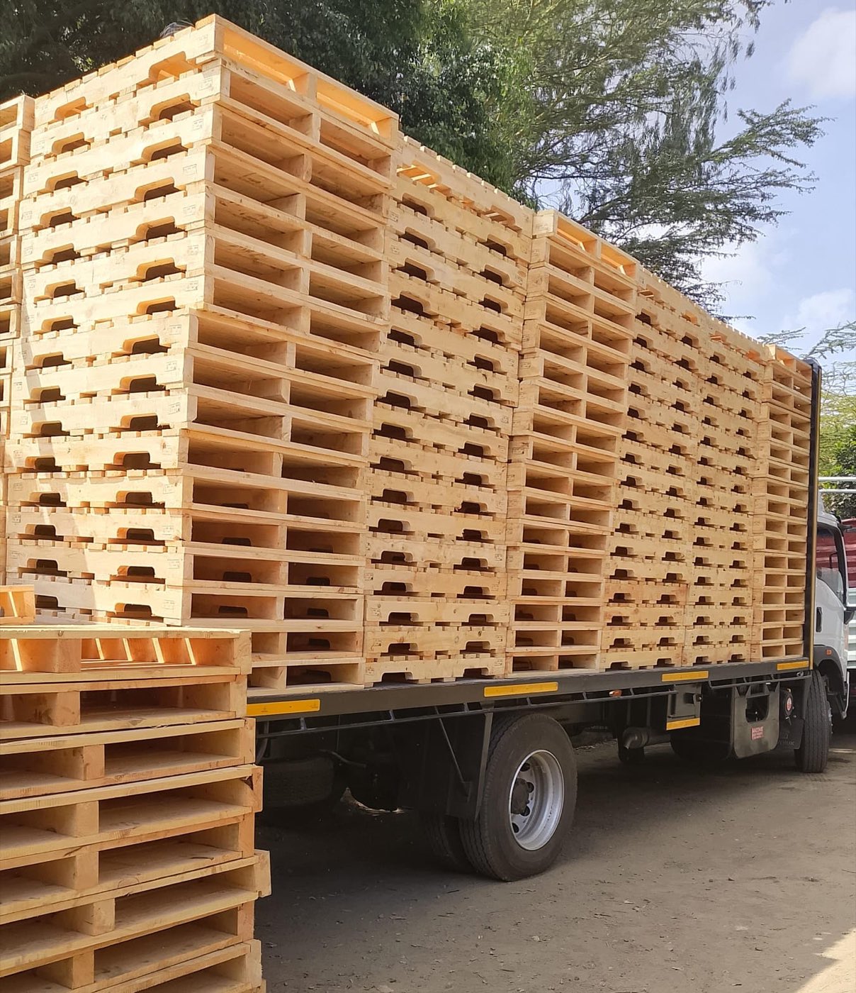 Heat-treated Kenpack wooden pallets loaded on a truck for sea and air export